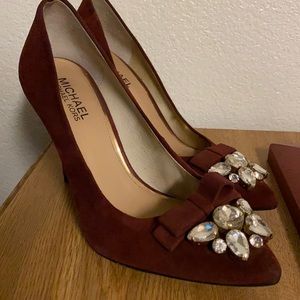 MICHAEL KORS Felicity Maroon Suede Pumps. There is discoloration on left shoe.